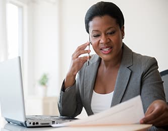 woman talking on mobile phone in the office