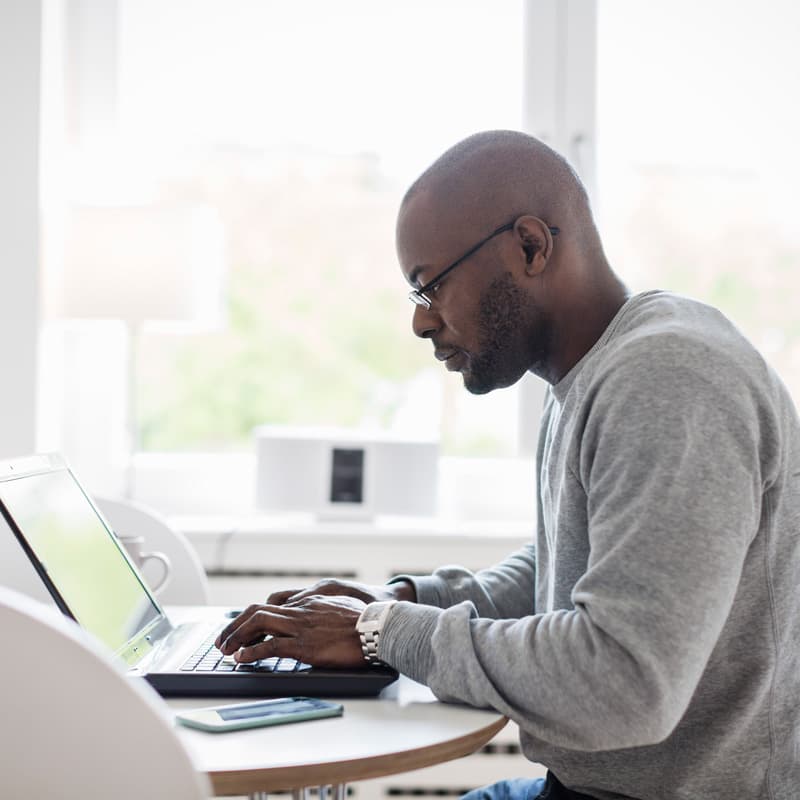 man working on laptop