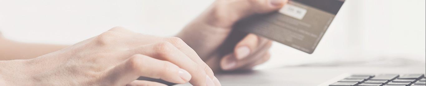 woman entering credit card data on her laptop