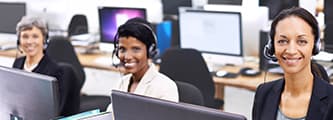 group of workers each on their own headset