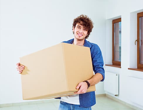 Student holding a package