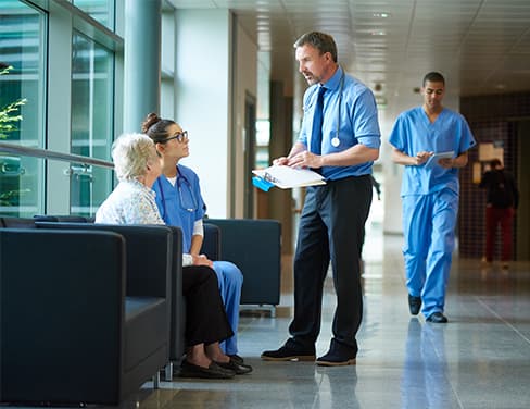 Doctor speaking with patient