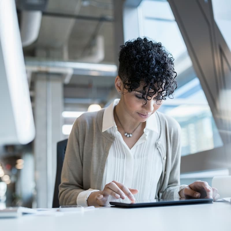 woman working on mobile device