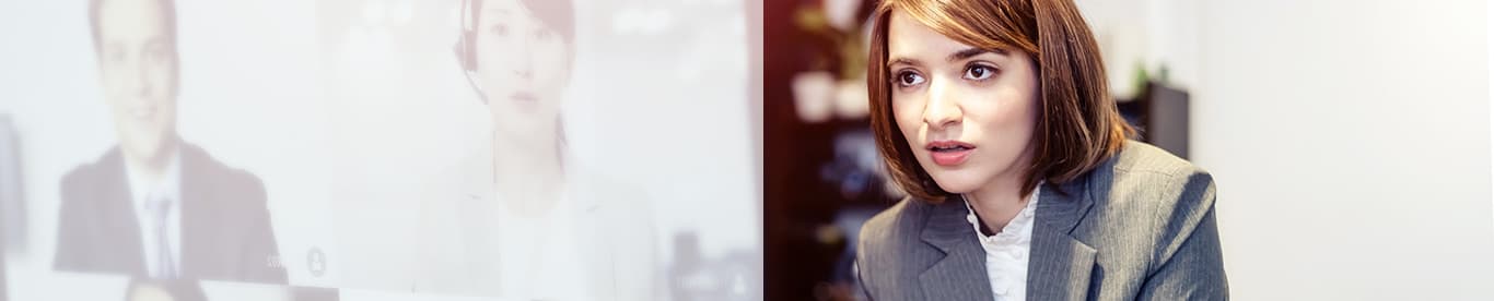 woman  talking to colleagues using video  conferecing